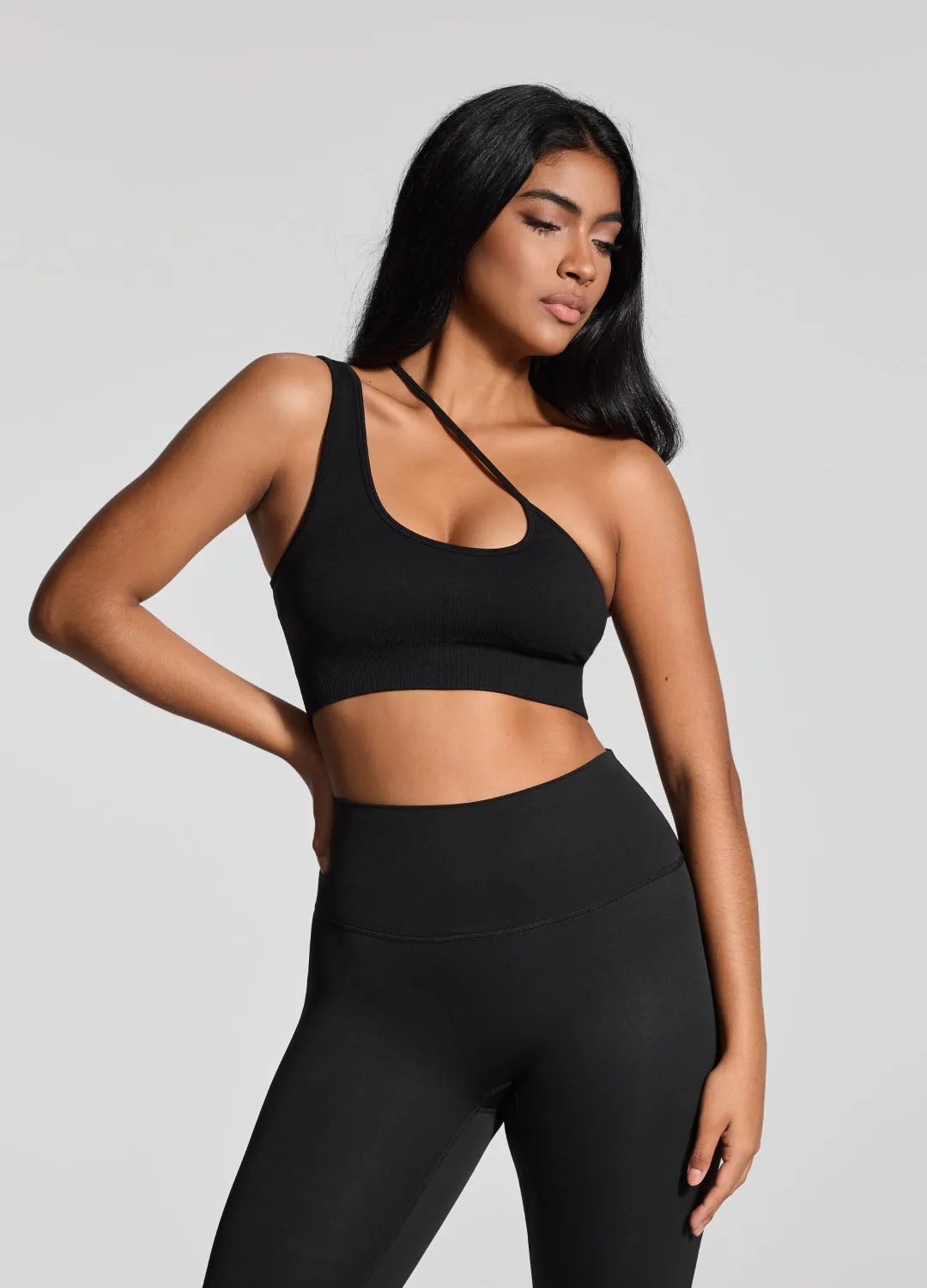Pilates studio clients Soft Structure Asymmetrical Sports Bra