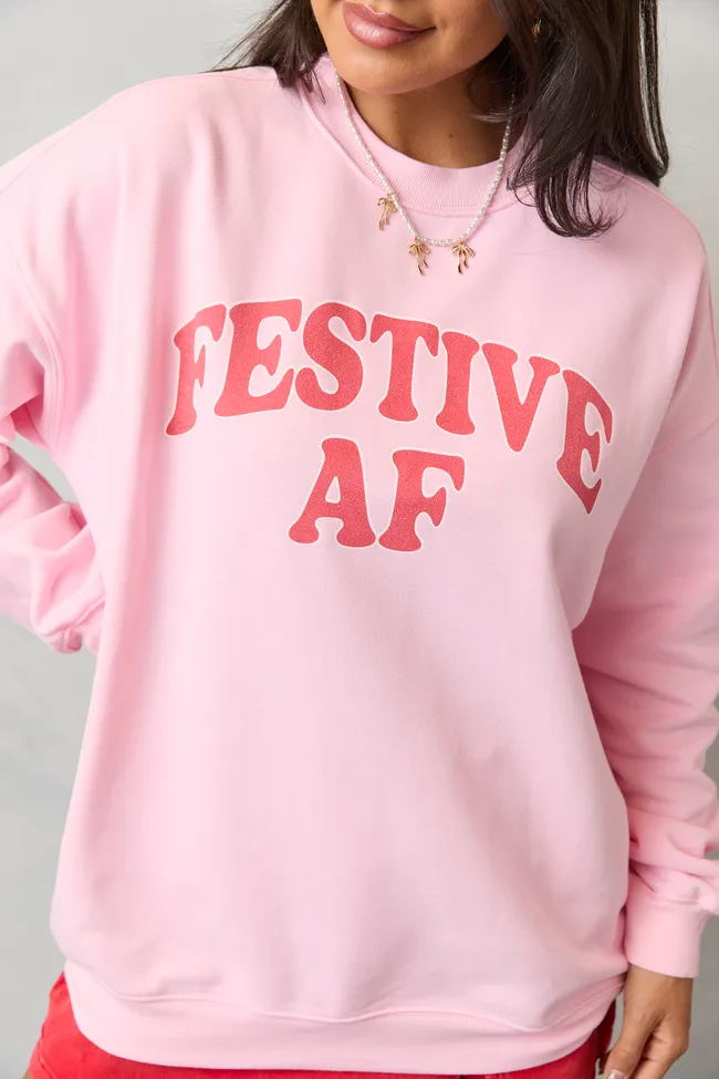 Warm and Cozy Festive AF Light Pink Graphic Sweatshirt