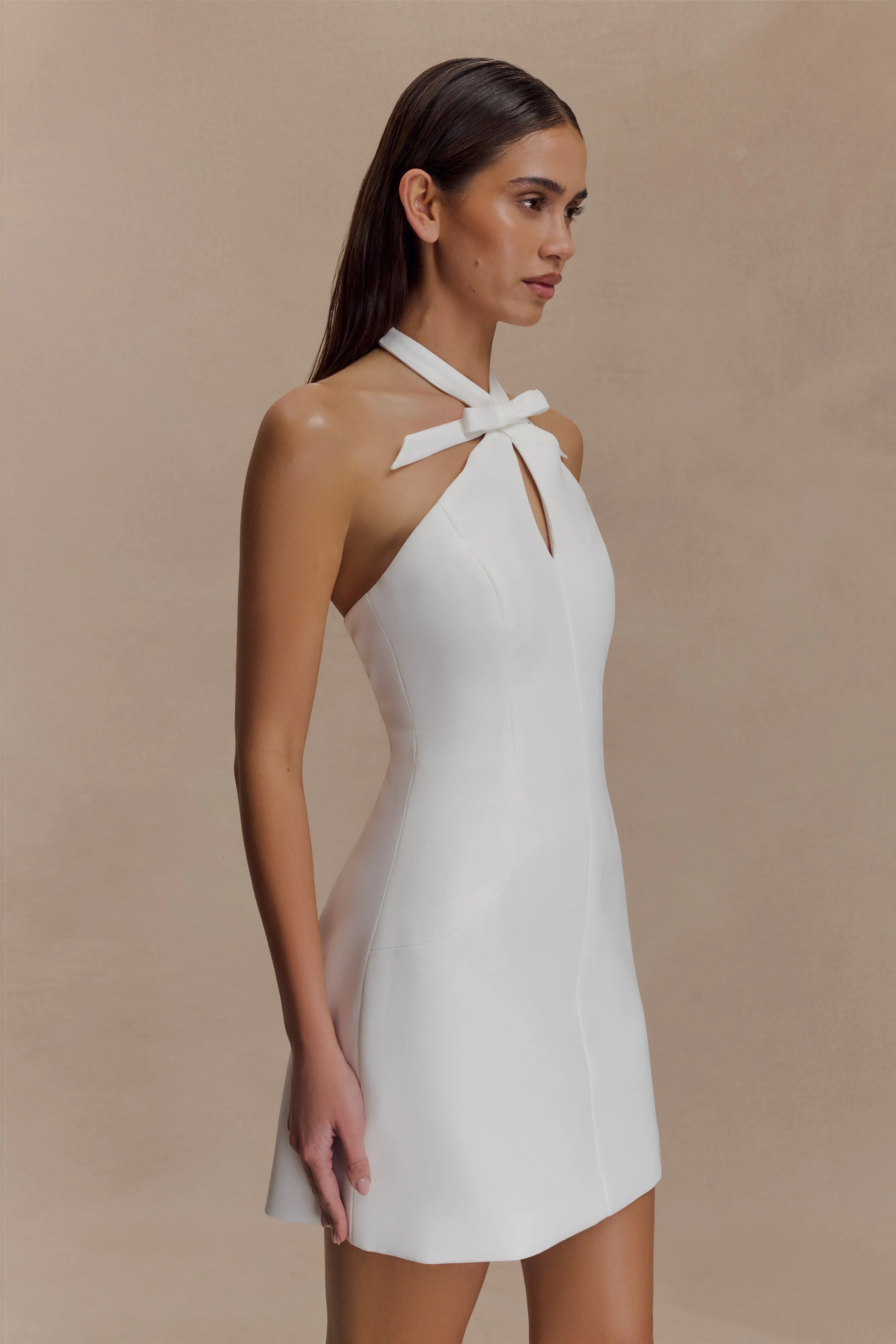 Freya Halter Bow Mini Dress - Ivory Sharp Motion