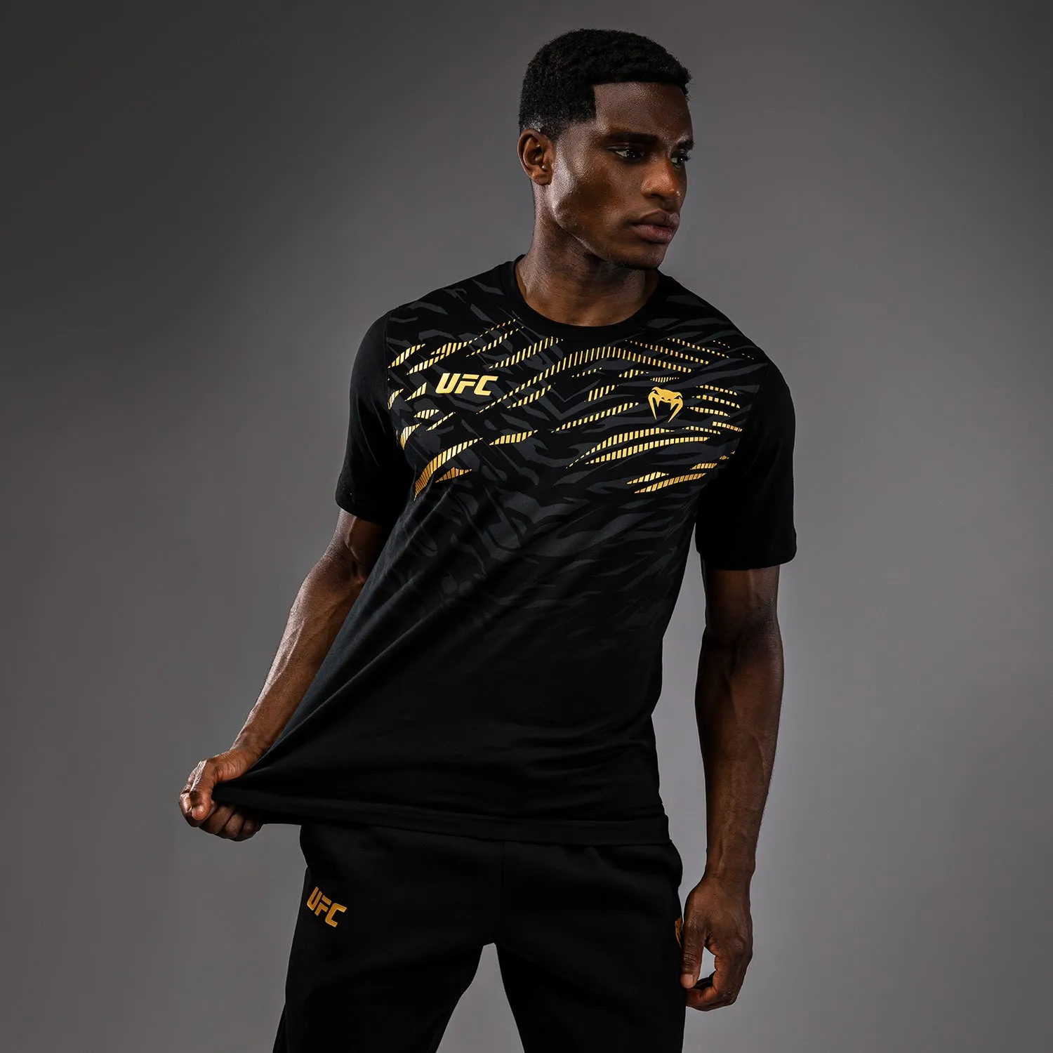 UFC Fusion by Venum Men??s Replica Short Sleeve T-Shirt - Champion Stretch performance